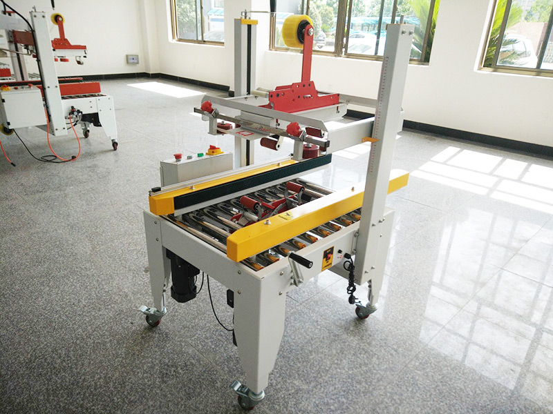 JS-FXZ500B 左(zuǒ)右驅動配聯(lian)線手動自動(dong)折蓋膠帶封(fēng)箱機